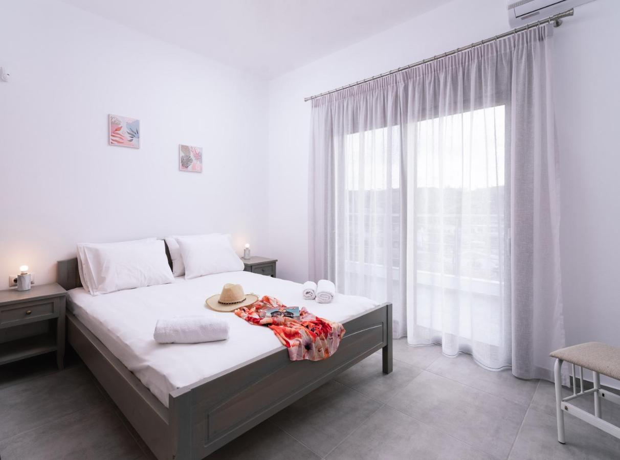 Lychnos Apartments Камиларион Экстерьер фото